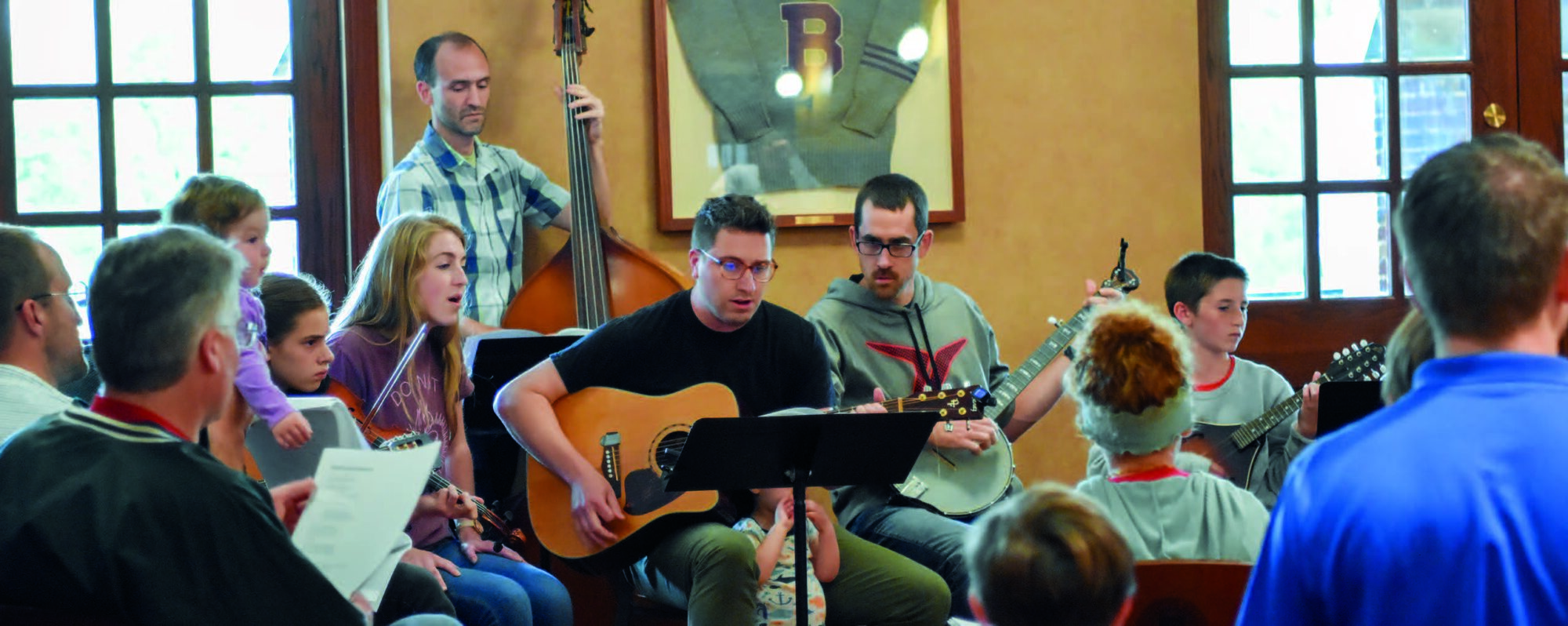 Center for Family Life Students and family members playing music